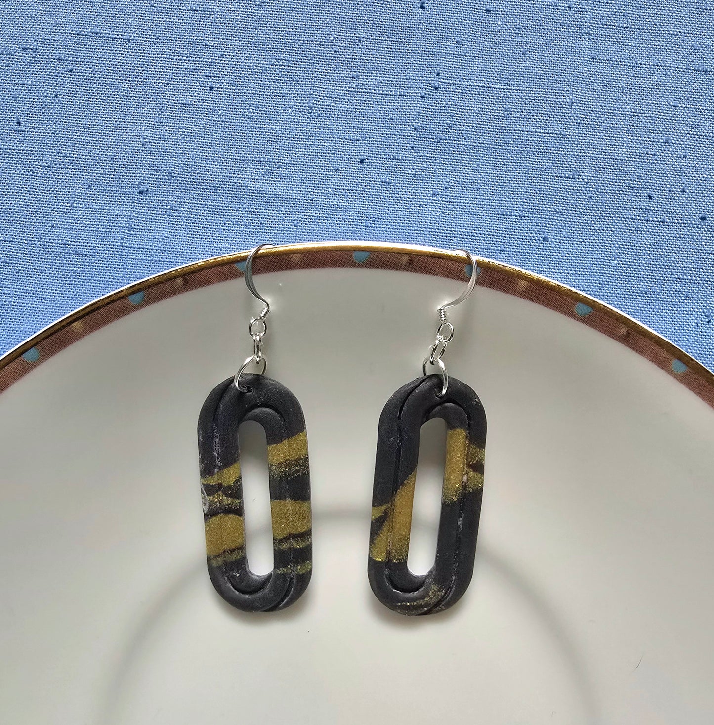 Black and gold drops