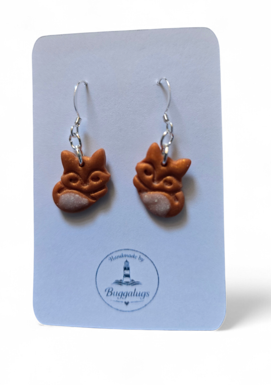 While tailed fox earrings