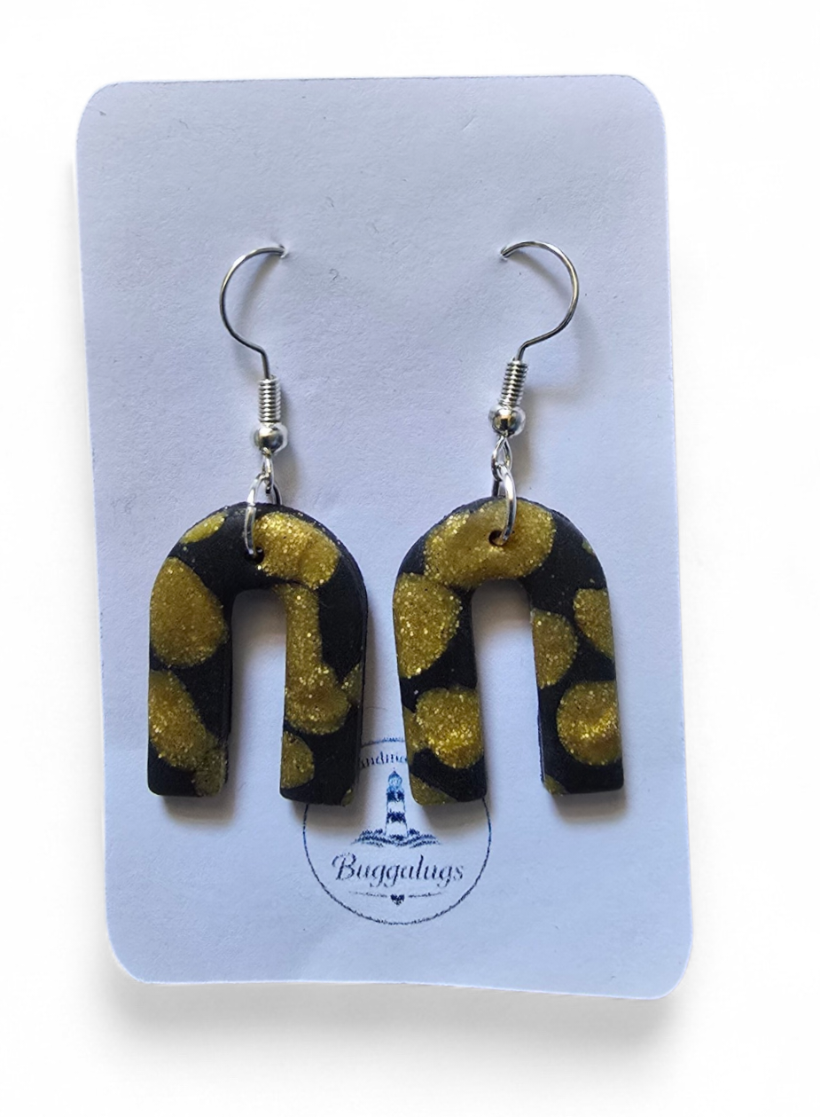 Black and gold arch earrings
