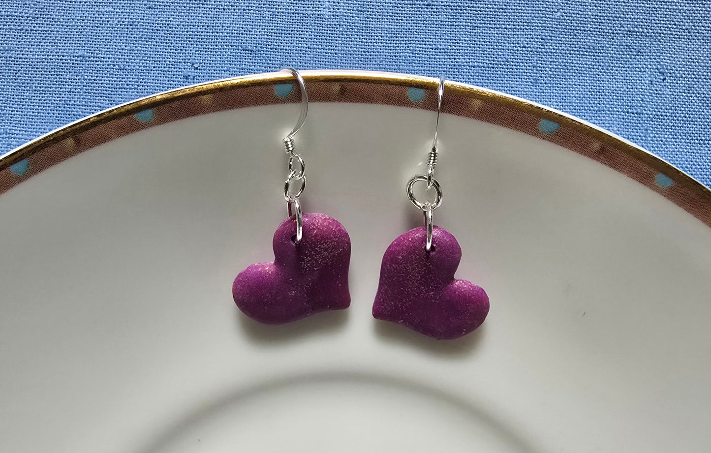 Maroon and gold heart earrings