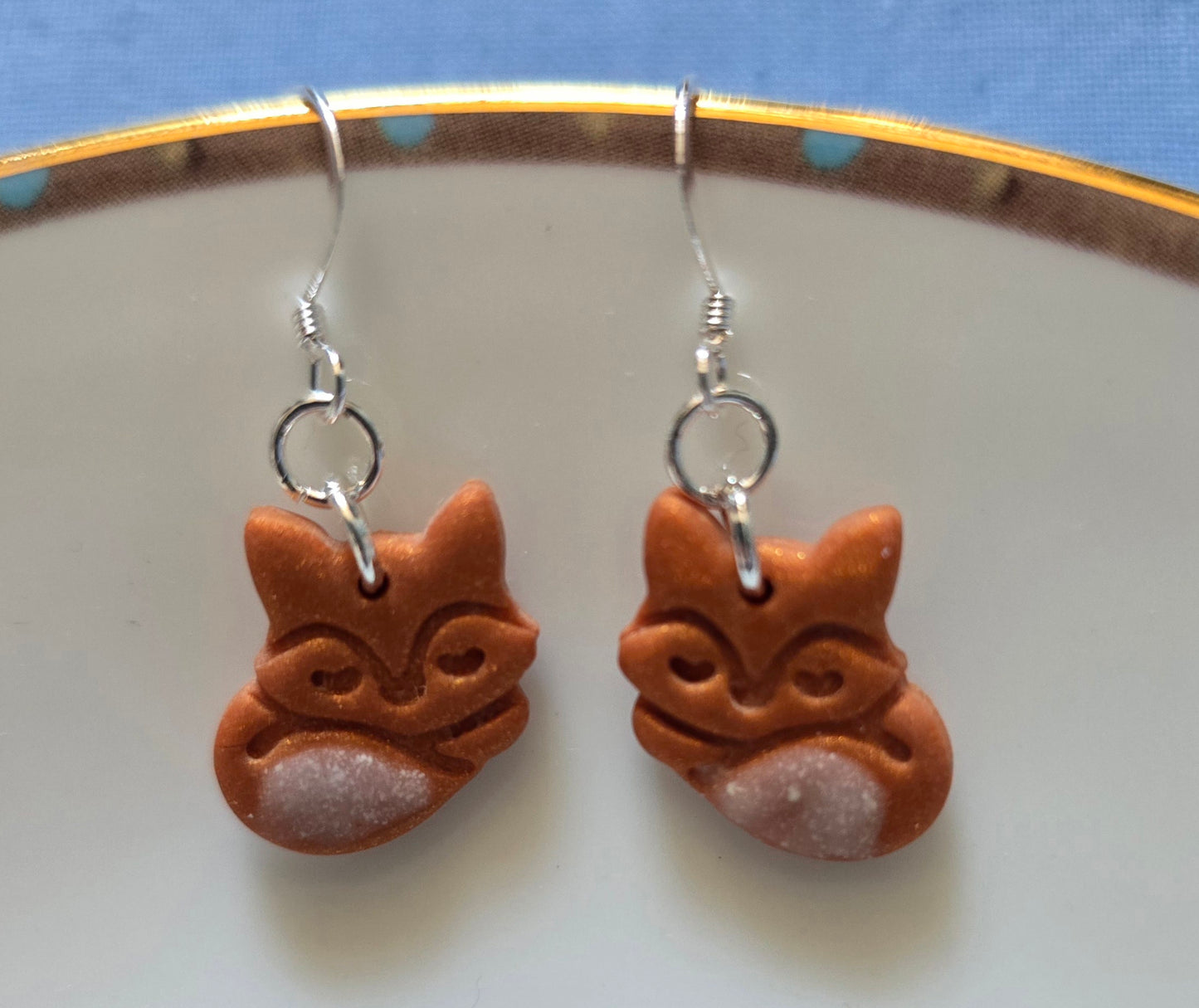 While tailed fox earrings