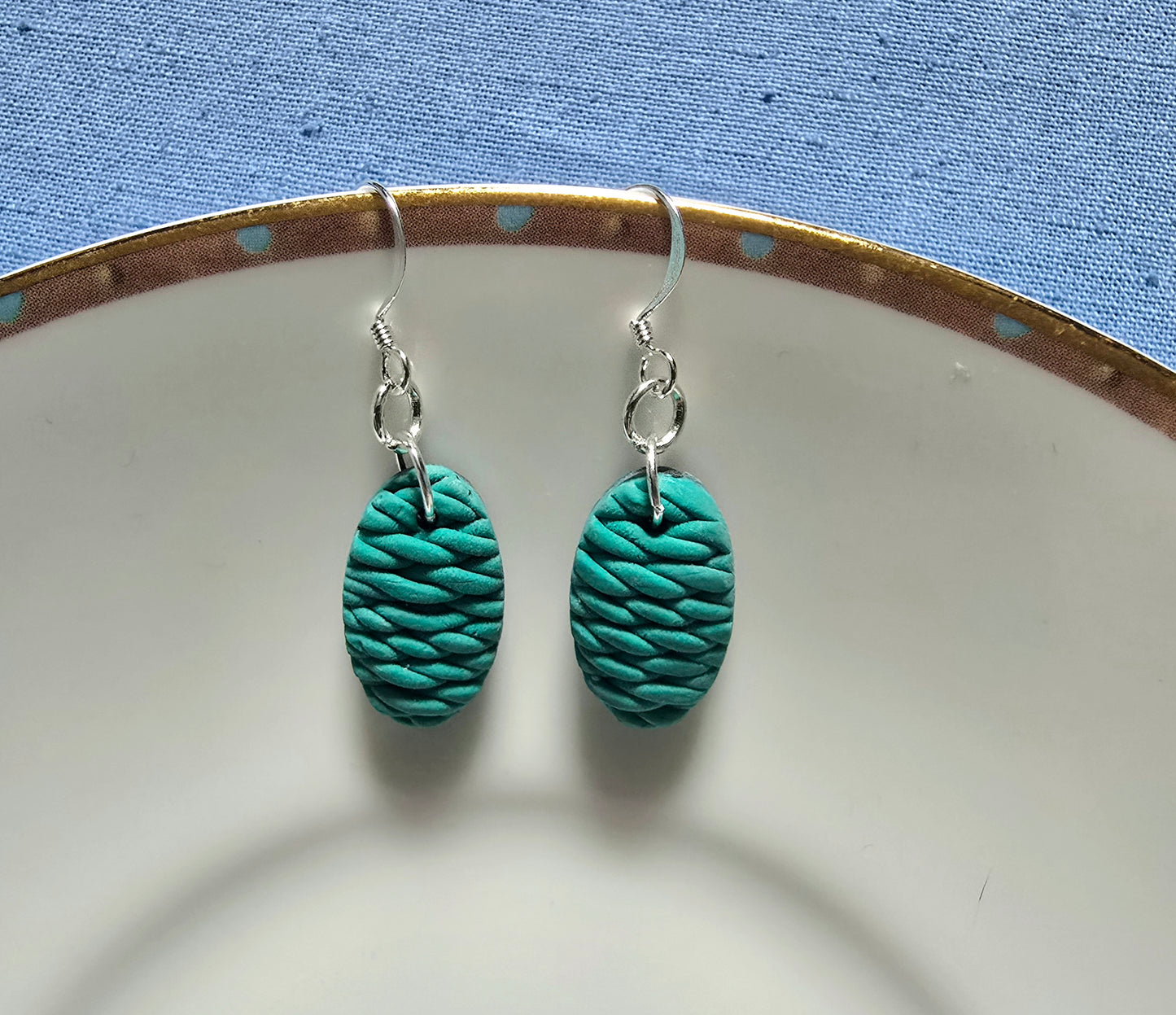 Green thread drop earrings