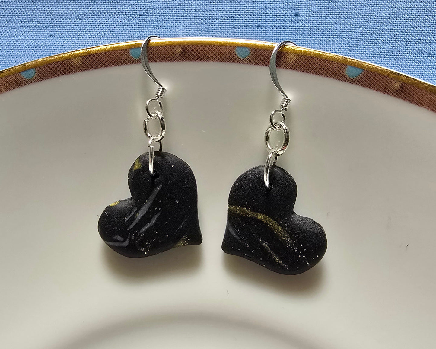 Black, silver and gold sparkle hearts